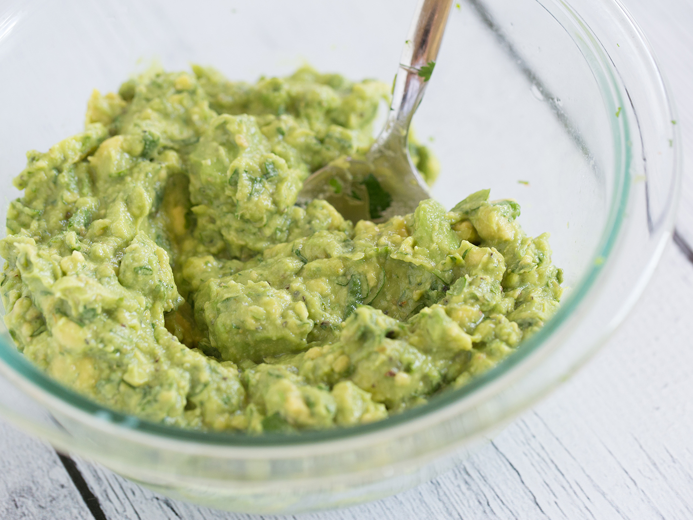 guacamole in a bowl with text overlay