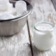 yogurt in jar and bowl of strained yogurt