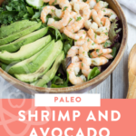 salad bowl with shrimp, lime and avocado and text overlay
